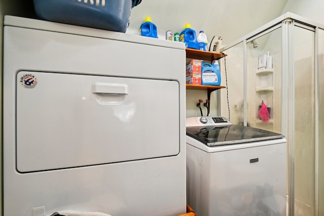 laundry room featuring independent washer and dryer