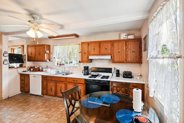 kitchen with ceiling fan, white appliances, and sink