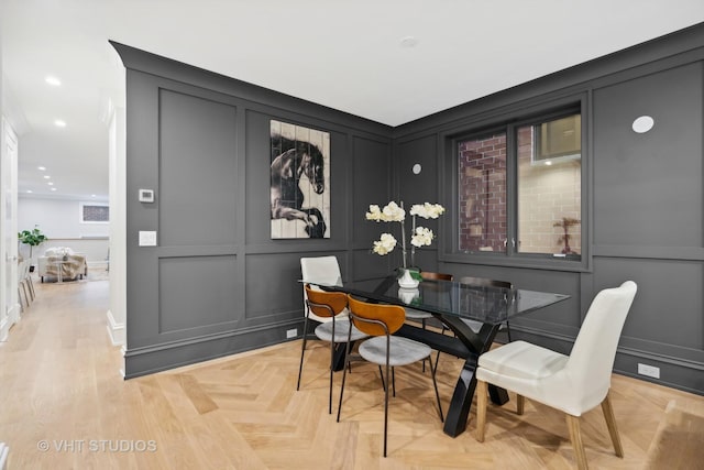 dining area with light parquet flooring