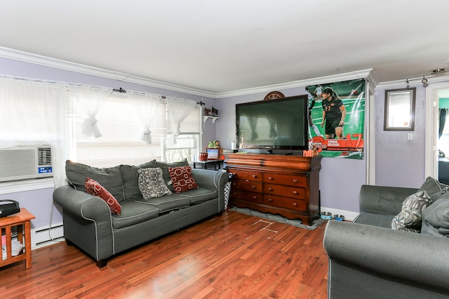 living room with a wealth of natural light, ornamental molding, and dark hardwood / wood-style floors