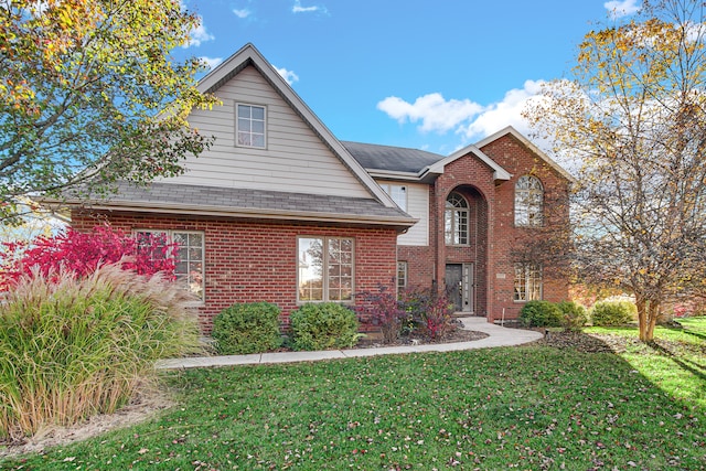 view of property with a front lawn