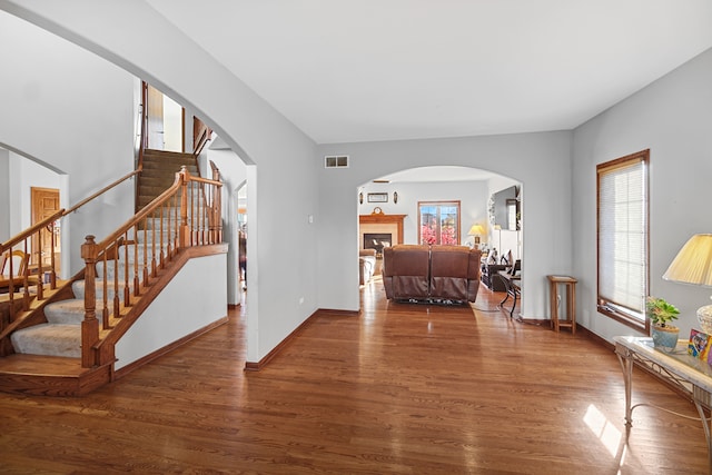 living room with dark hardwood / wood-style floors