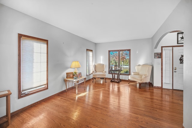 unfurnished room with hardwood / wood-style floors