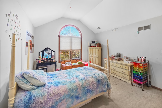 bedroom with carpet flooring and vaulted ceiling