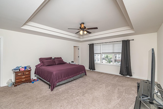 12740 Timber Wood Cir, Plainfield, IL 60585 - bedroom featuring a raised ceiling, carpet, baseboards, and a ceiling fan