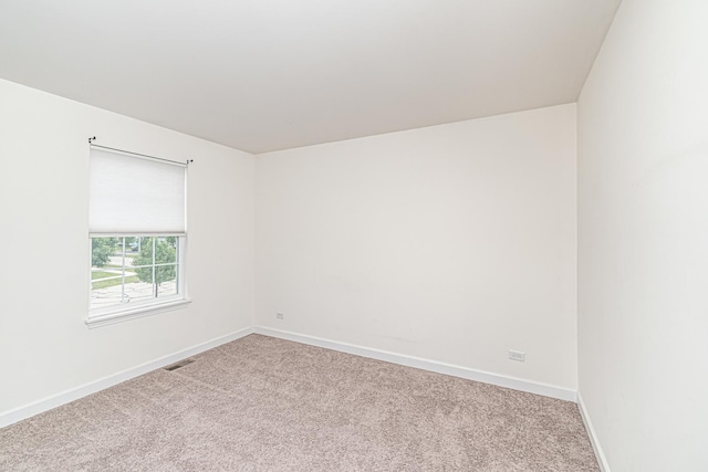 12740 Timber Wood Cir, Plainfield, IL 60585 - carpeted empty room with baseboards