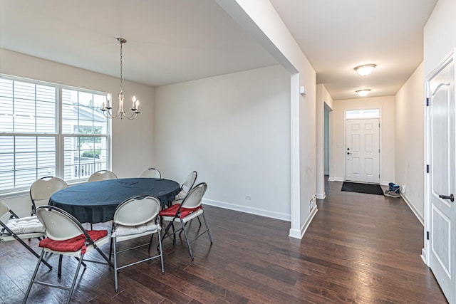 12740 Timber Wood Cir, Plainfield, IL 60585 - dining area featuring a chandelier, dark wood-type flooring, and baseboards