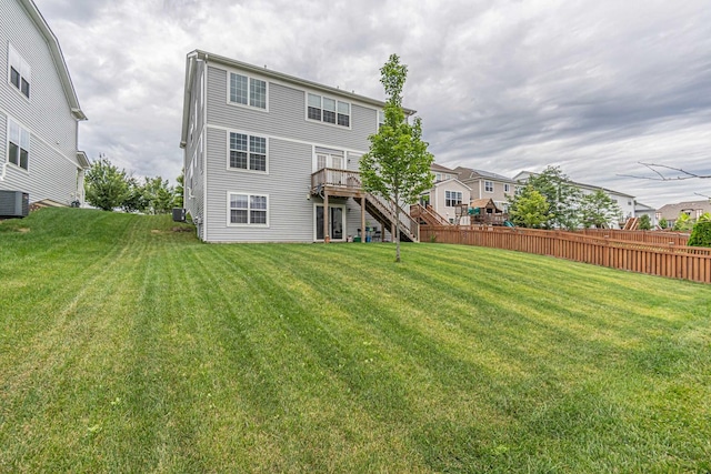 12740 Timber Wood Cir, Plainfield, IL 60585 - back of property featuring stairs, a deck, and central air condition unit