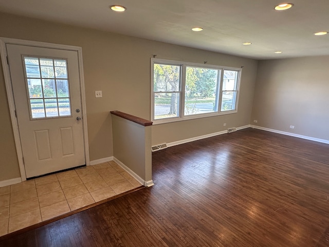 foyer with wood-type flooring