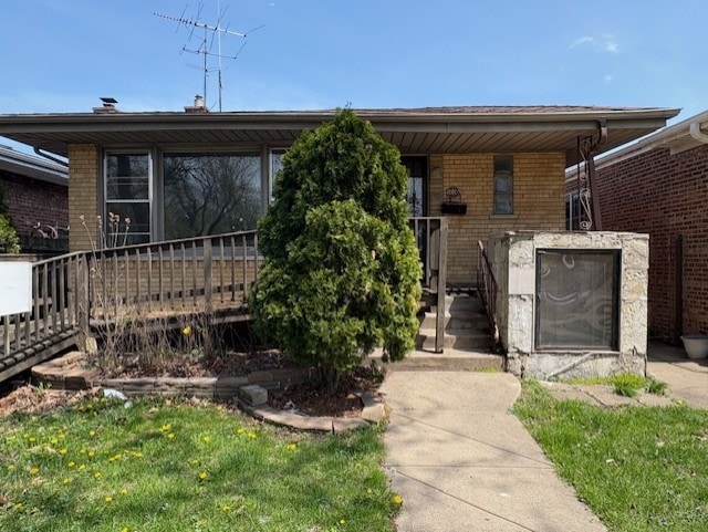 10809 S Mackinaw Ave, Chicago, IL 60617 - view of front facade featuring brick siding