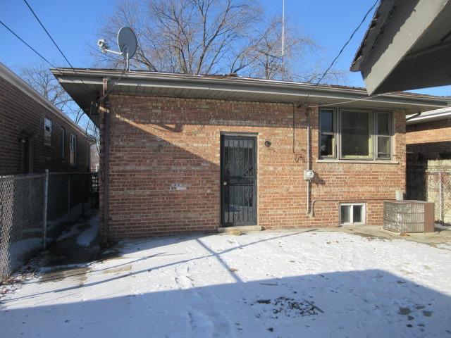 view of snow covered property