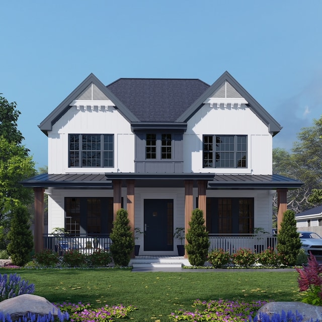 view of front facade featuring covered porch and a front yard