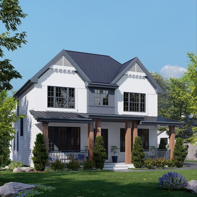 modern inspired farmhouse with a front yard and a porch