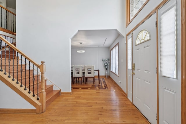 entrance foyer with light wood-type flooring