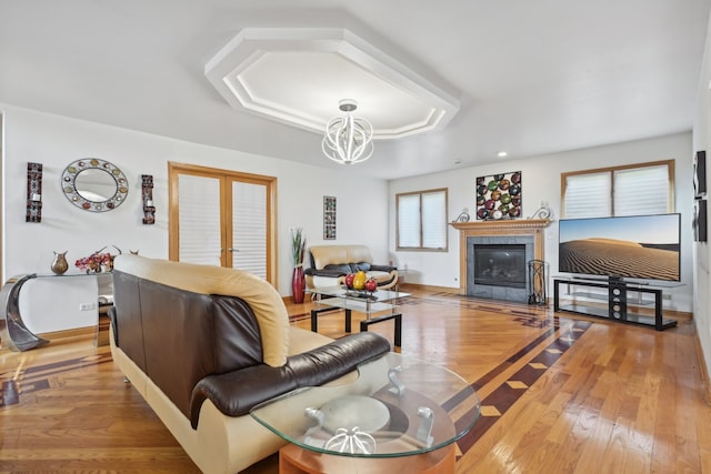 living room featuring a fireplace and light hardwood / wood-style flooring