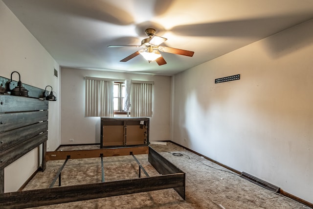 bedroom with ceiling fan and carpet floors