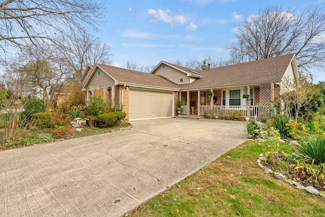 single story home with covered porch and a garage