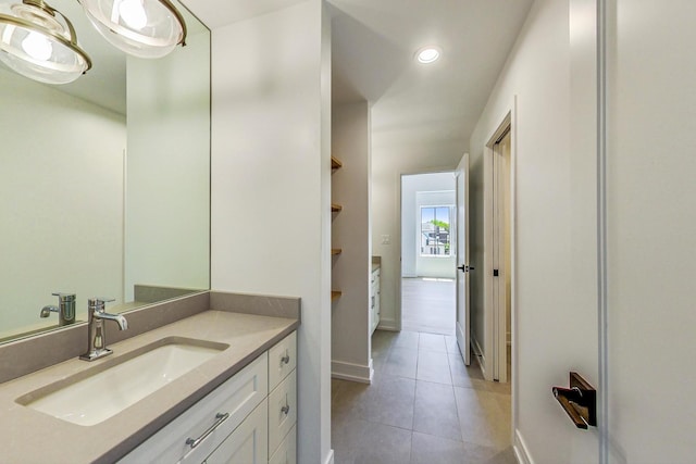 172 E Crescent Ave, Elmhurst, IL 60126 - bathroom with tile patterned flooring, vanity, baseboards, and recessed lighting