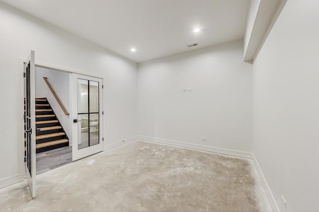 172 E Crescent Ave, Elmhurst, IL 60126 - spare room with unfinished concrete floors, stairway, recessed lighting, and baseboards