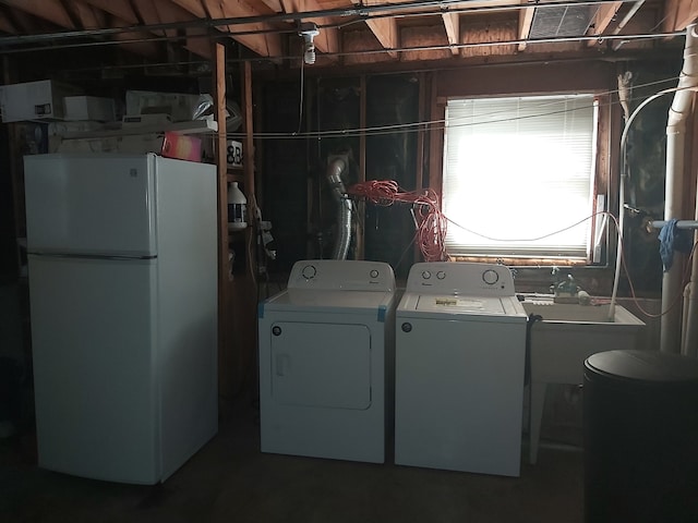 laundry area with washer and dryer