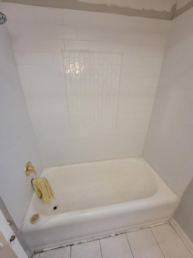 bathroom with tile patterned floors