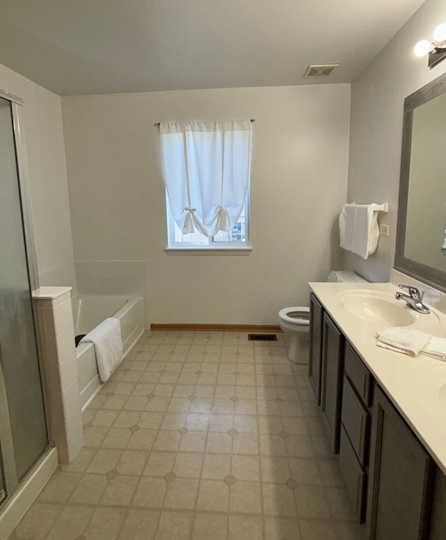 full bathroom with separate shower and tub, vanity, and toilet