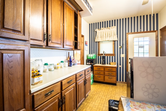 kitchen featuring ceiling fan