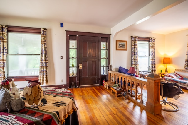 entryway with wood-type flooring