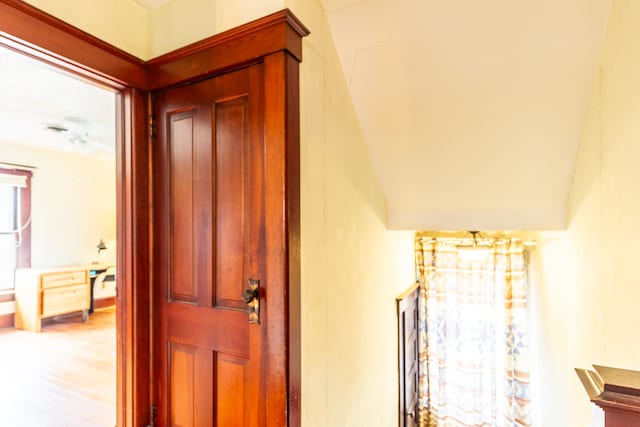 hallway featuring hardwood / wood-style flooring