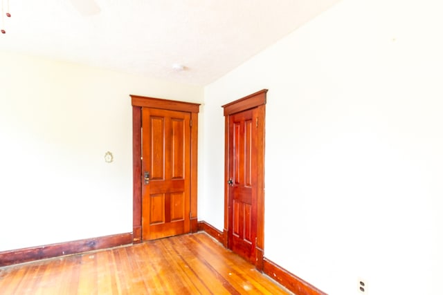 empty room with light hardwood / wood-style floors