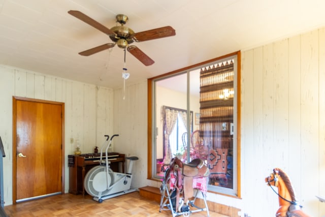 miscellaneous room with ceiling fan and light parquet floors