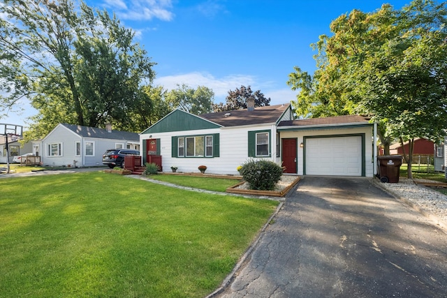 ranch-style home with a front yard and a garage