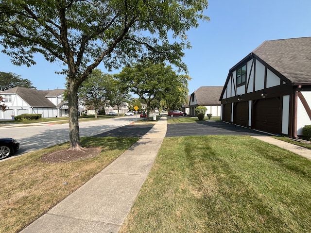 view of yard with a garage