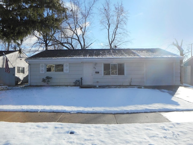 ranch-style house featuring a garage