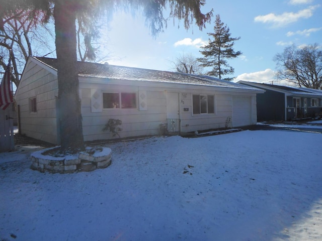 single story home with a garage