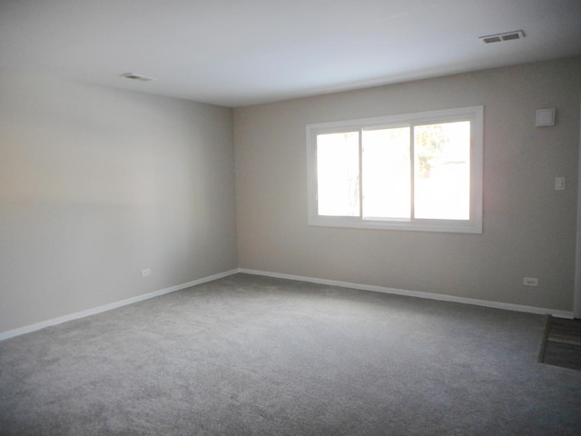 spare room with carpet flooring