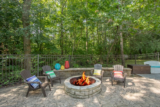 view of patio / terrace with a fire pit