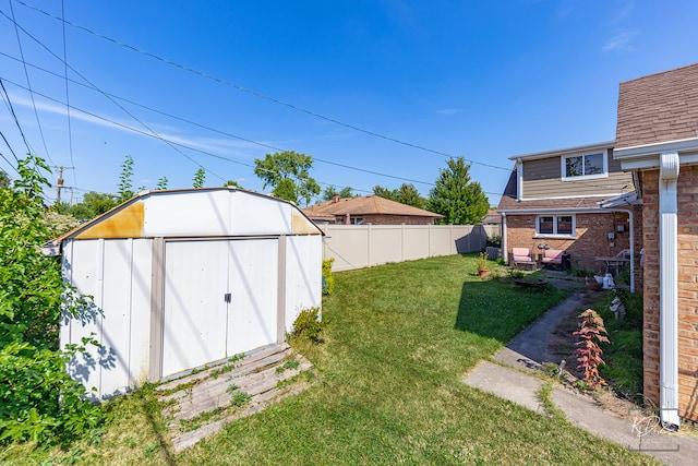 view of yard with a storage shed