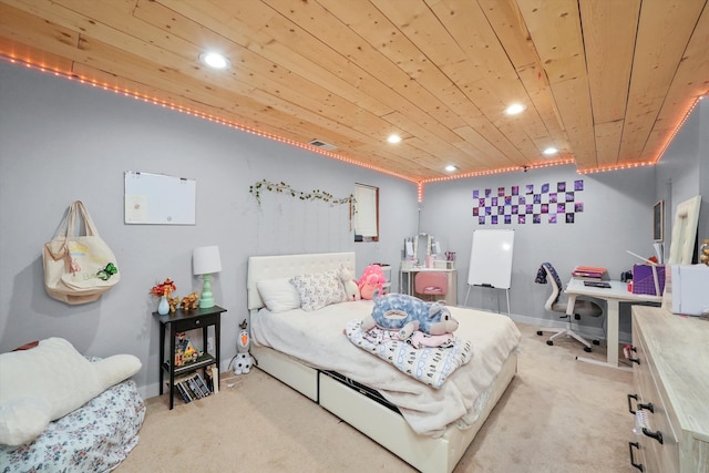 bedroom featuring wood ceiling and light carpet