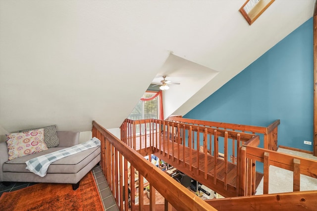 tiled bedroom featuring a skylight