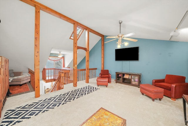 living room with carpet flooring, track lighting, vaulted ceiling, and ceiling fan