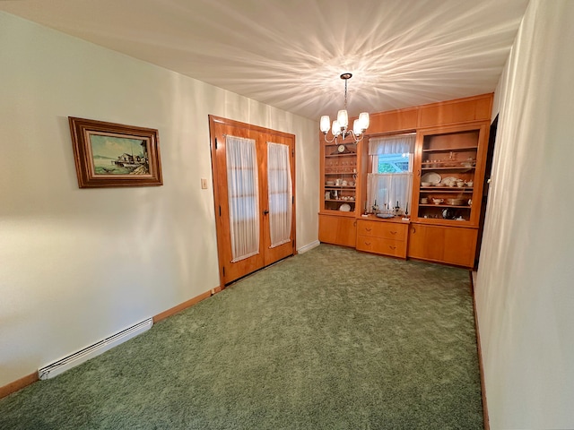 interior space with a baseboard heating unit, french doors, built in features, dark colored carpet, and a notable chandelier