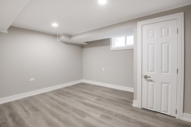 basement with light wood-type flooring