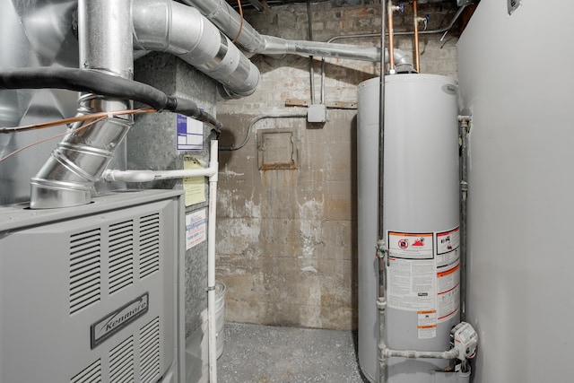 utility room featuring gas water heater