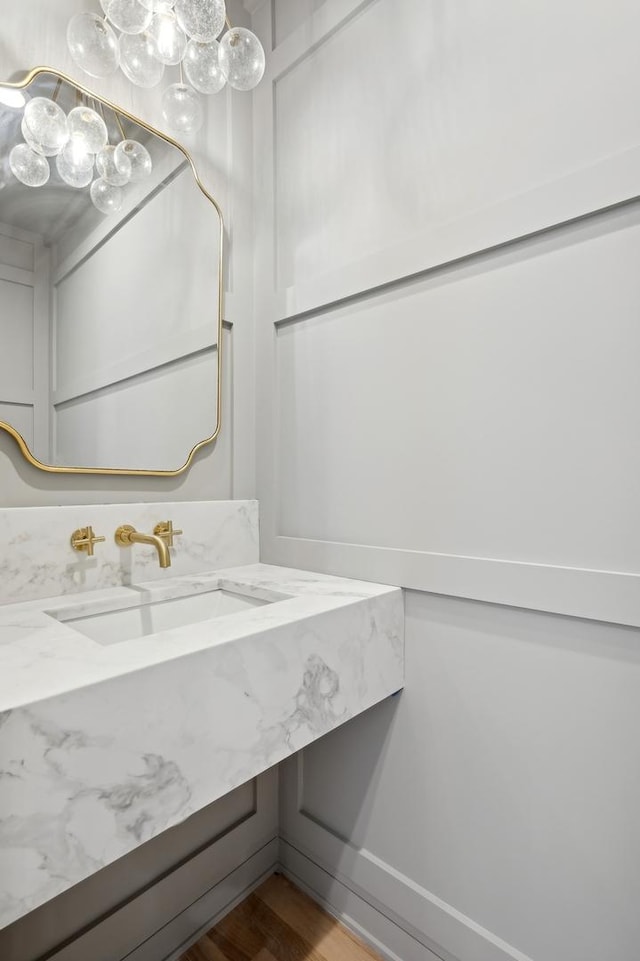 bathroom featuring vanity and hardwood / wood-style flooring