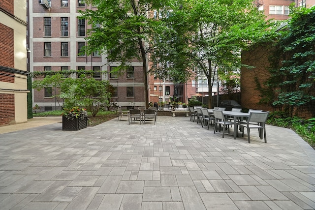 view of home's community featuring a patio area