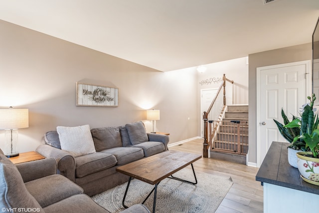 living room with light hardwood / wood-style floors