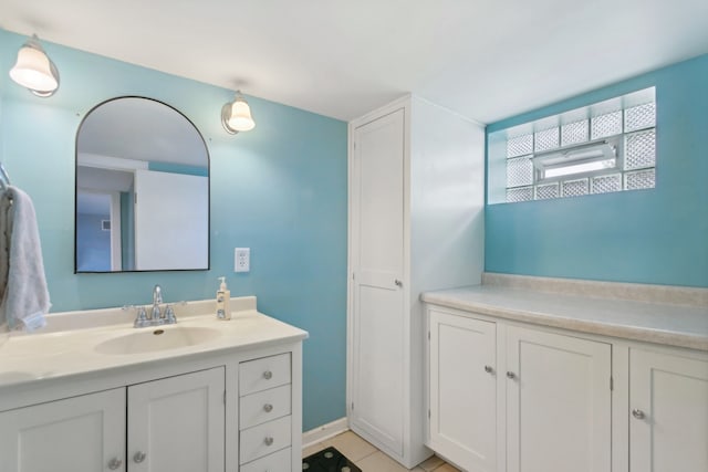 bathroom with vanity and tile patterned floors