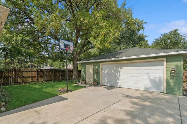 garage with a yard