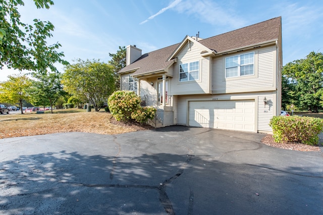 view of front of property featuring a garage